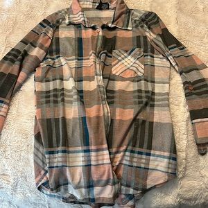 Size medium flannel. Sleeves do not completely cover arms.